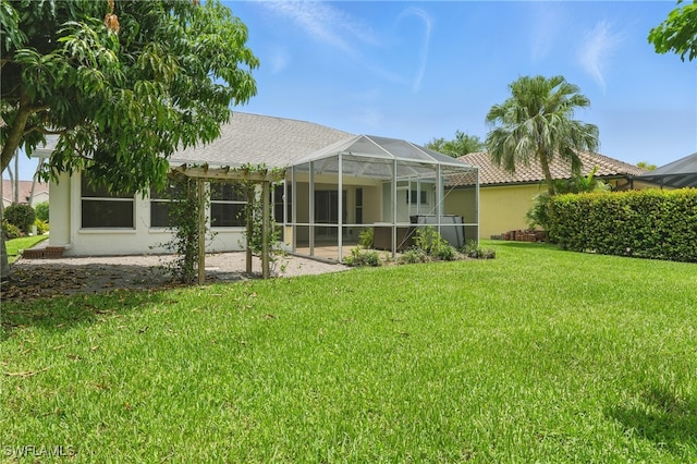 6643 Craven Hill Way, Naples, FL 34104 - back of property featuring a yard, a patio area, a lanai, and stucco siding