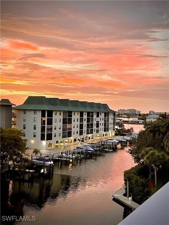 377 Vanderbilt Beach Rd Unit 103, Naples, FL 34108 - water view with a dock