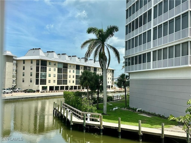 377 Vanderbilt Beach Rd Unit 103, Naples, FL 34108 - dock featuring a water view