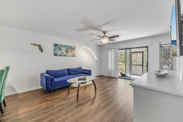 6296 Sugar Bush Ln Unit C, Fort Myers, FL 33908 - living room featuring a ceiling fan and wood finished floors