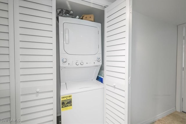 6296 Sugar Bush Ln Unit C, Fort Myers, FL 33908 - laundry area with stacked washing machine and dryer