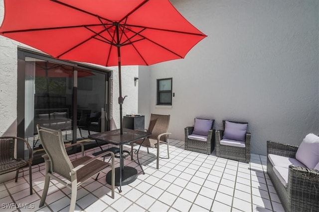 6296 Sugar Bush Ln Unit C, Fort Myers, FL 33908 - view of patio / terrace with outdoor lounge area and outdoor dining space