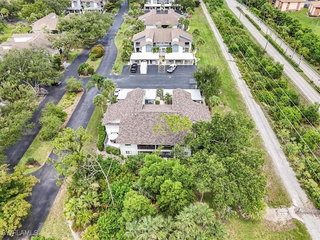 6296 Sugar Bush Ln Unit C, Fort Myers, FL 33908 - bird's eye view of a tree filled landscape