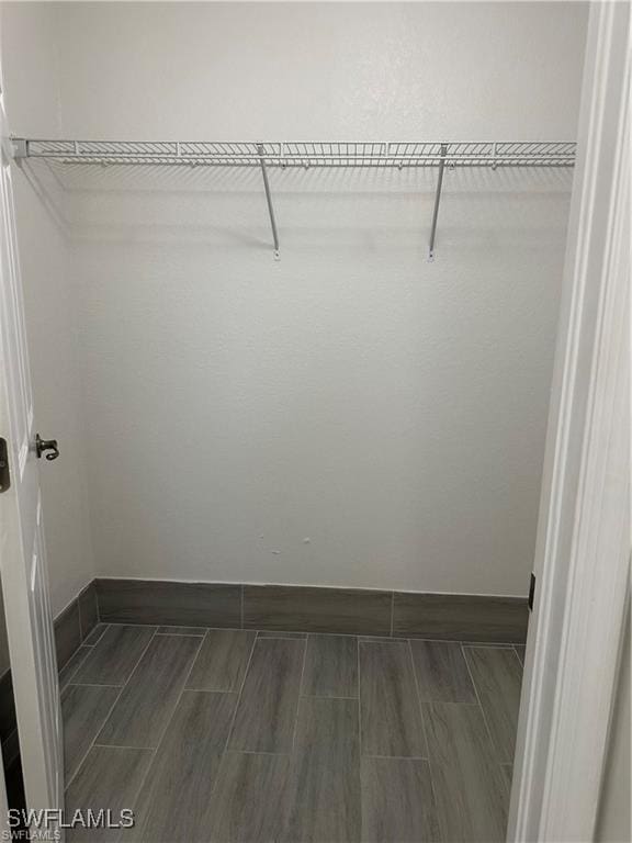 4520 19th St SW, Lehigh Acres, FL 33973 - spacious closet featuring wood finish floors