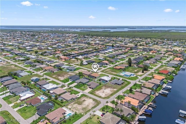 301 NW 36th Ave, Cape Coral, FL 33993 - aerial view of property and surrounding area with nearby suburban area