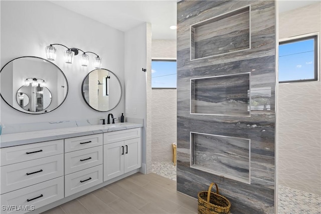 301 NW 36th Ave, Cape Coral, FL 33993 - bathroom with double vanity and a walk in shower