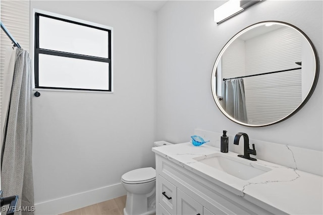 301 NW 36th Ave, Cape Coral, FL 33993 - full bath with vanity, wood finished floors, and a shower with curtain