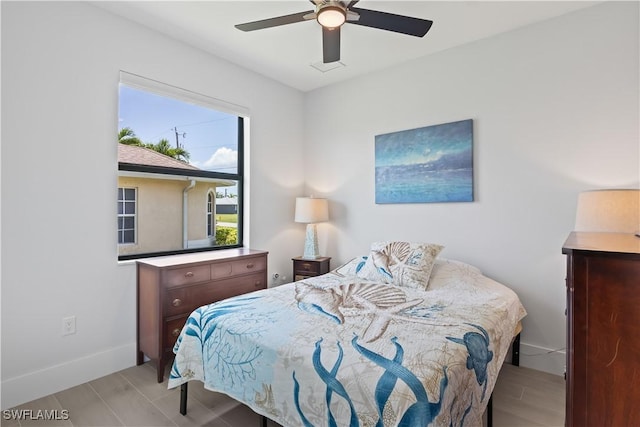 301 NW 36th Ave, Cape Coral, FL 33993 - bedroom featuring a ceiling fan and baseboards