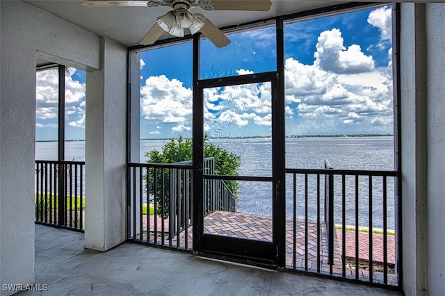 1900 Virginia Ave Unit 102, Fort Myers, FL 33901 - unfurnished sunroom with a water view and a ceiling fan