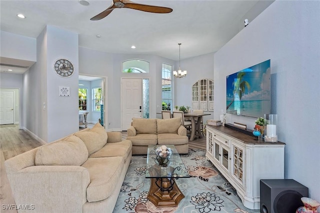 8556 Pepper Tree Way, Naples, FL 34114 - living area featuring light wood-type flooring, a ceiling fan, recessed lighting, and a chandelier