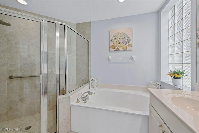 8556 Pepper Tree Way, Naples, FL 34114 - bathroom featuring a bath, healthy amount of natural light, and a shower stall