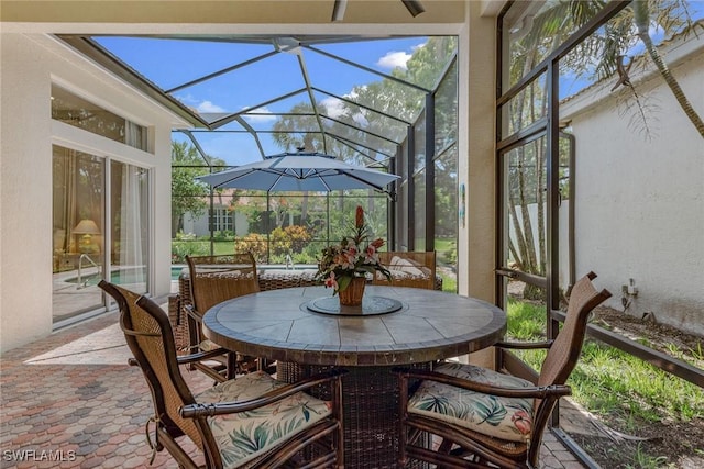 8556 Pepper Tree Way, Naples, FL 34114 - sunroom featuring outdoor dining area