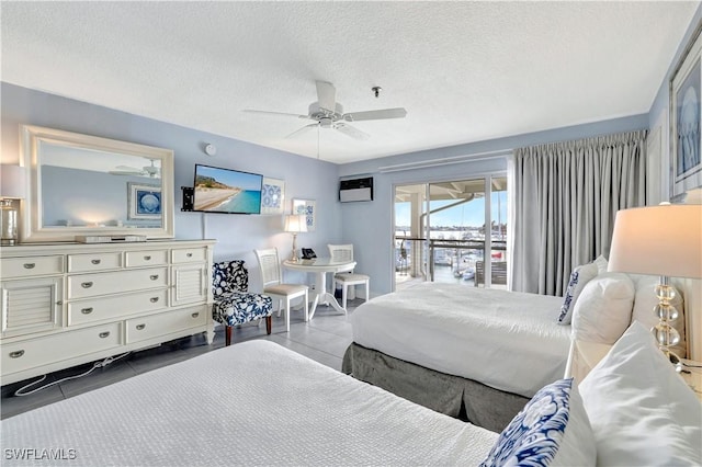 900 Broad Ave S Unit 320, Naples, FL 34102 - bedroom featuring access to outside, a textured ceiling, ceiling fan, and tile patterned floors