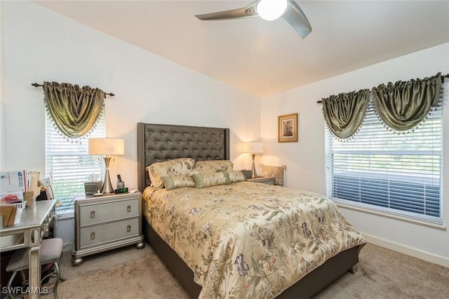 15029 Toscana Way, Naples, FL 34120 - carpeted bedroom with baseboards and a ceiling fan
