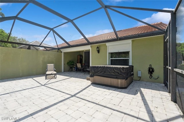 15029 Toscana Way, Naples, FL 34120 - view of patio featuring a hot tub and a lanai