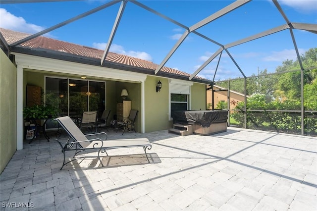 15029 Toscana Way, Naples, FL 34120 - view of patio with a hot tub and glass enclosure