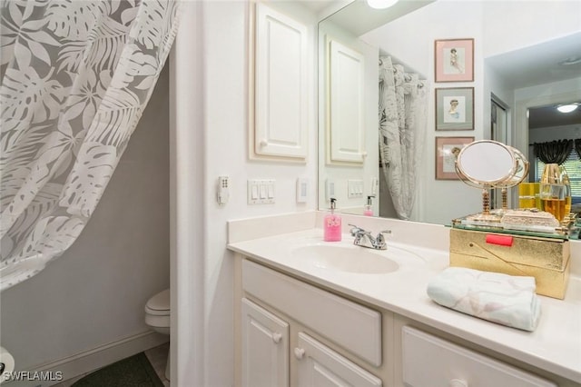 15029 Toscana Way, Naples, FL 34120 - bathroom featuring toilet and vanity