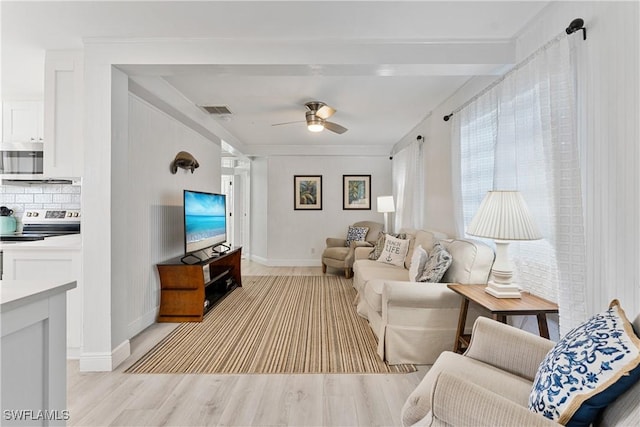 111 Bahia Via, Fort Myers Beach, FL 33931 - living room with light wood-style flooring and a ceiling fan