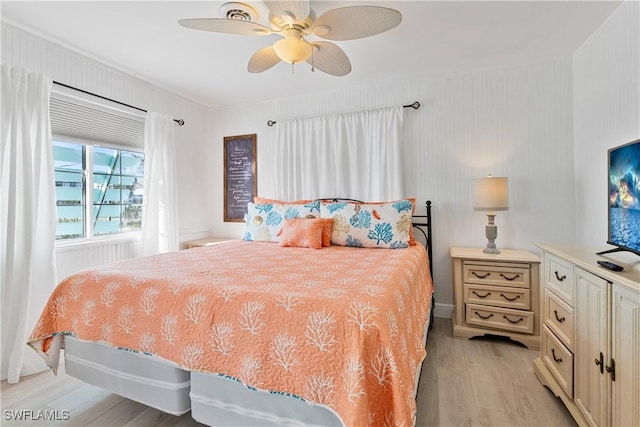 111 Bahia Via, Fort Myers Beach, FL 33931 - bedroom with light wood-style floors and a ceiling fan