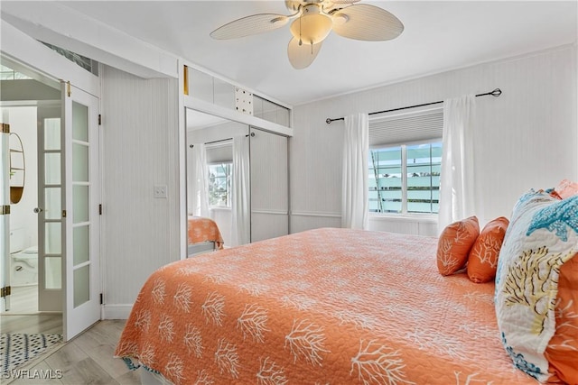 111 Bahia Via, Fort Myers Beach, FL 33931 - bedroom with wood finished floors and ceiling fan