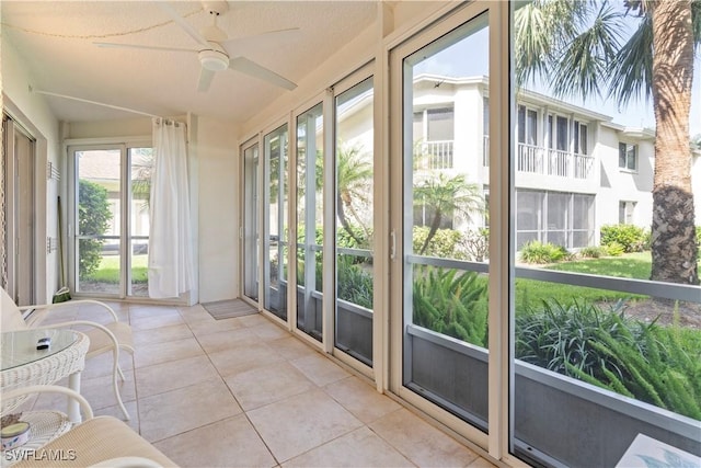 3200 Binnacle Dr Unit C1, Naples, FL 34103 - sunroom featuring ceiling fan, tile patterned flooring, and lofted ceiling