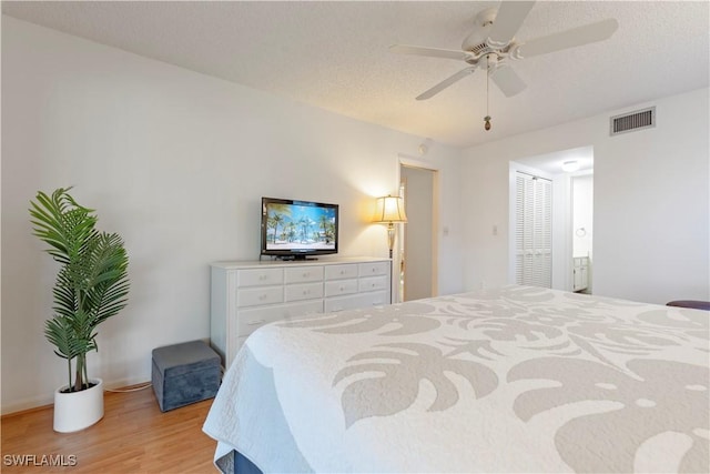 3200 Binnacle Dr Unit C1, Naples, FL 34103 - bedroom featuring light wood-style floors and a ceiling fan