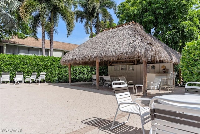 3200 Binnacle Dr Unit C1, Naples, FL 34103 - view of patio featuring a gazebo
