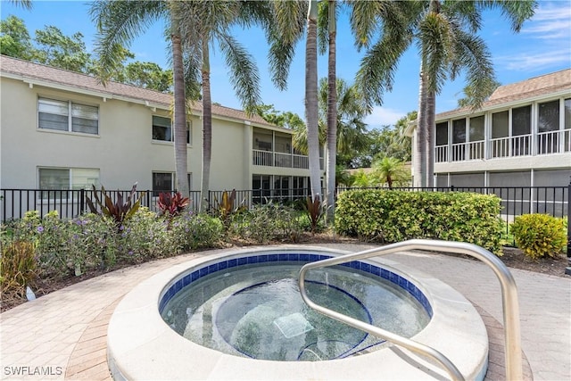 3200 Binnacle Dr Unit C1, Naples, FL 34103 - view of swimming pool featuring a hot tub