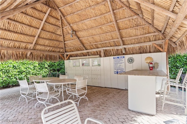 3200 Binnacle Dr Unit C1, Naples, FL 34103 - view of patio / terrace with a gazebo and mail area