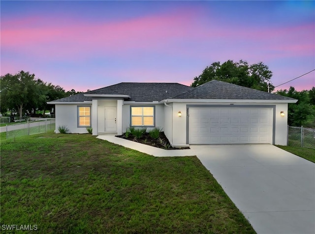 2801 50th St SW, Lehigh Acres, FL 33976 - single story home featuring driveway, an attached garage, stucco siding, and a shingled roof