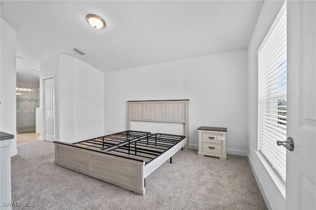 2801 50th St SW, Lehigh Acres, FL 33976 - bedroom featuring carpet and ensuite bath