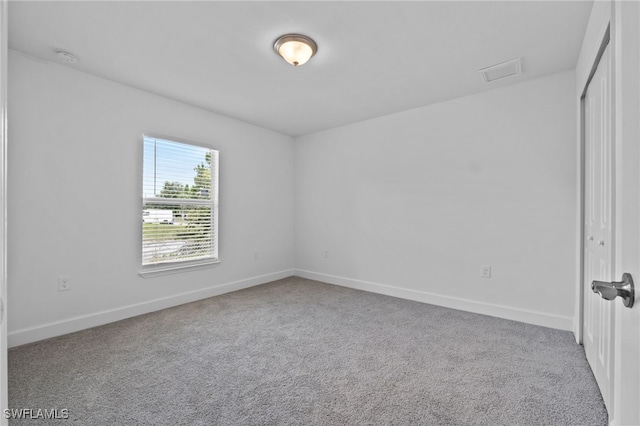 2801 50th St SW, Lehigh Acres, FL 33976 - spare room with carpet flooring