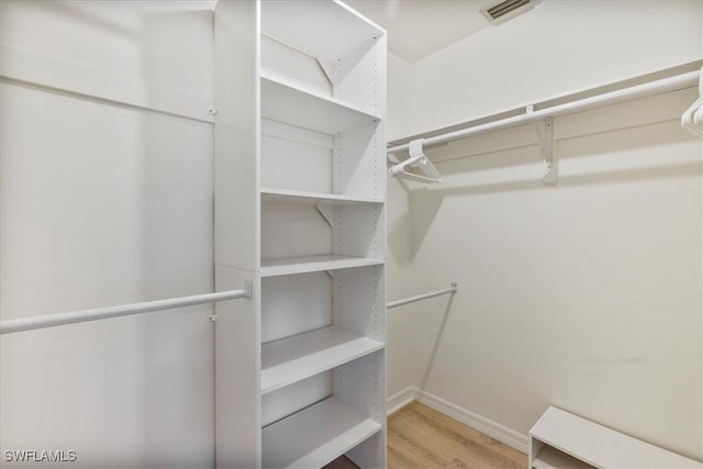 5034 Westminster Dr, Fort Myers, FL 33919 - spacious closet with wood finished floors