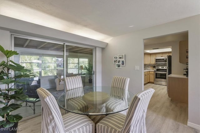 5034 Westminster Dr, Fort Myers, FL 33919 - dining area featuring light wood-type flooring