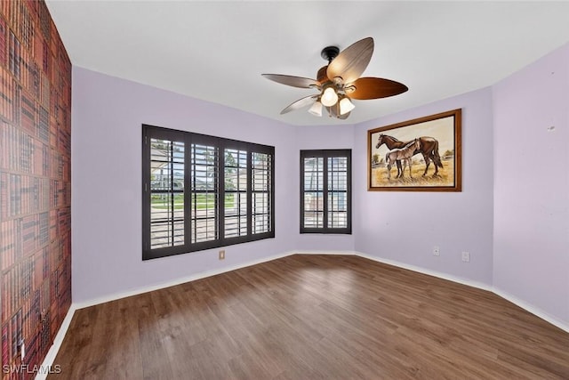 8060 Glenfinnan Cir, Fort Myers, FL 33912 - spare room featuring wood finished floors and a ceiling fan