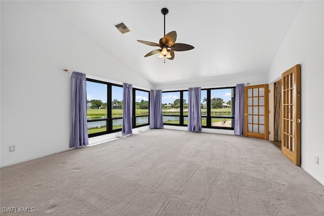 8060 Glenfinnan Cir, Fort Myers, FL 33912 - empty room with ceiling fan, carpet flooring, high vaulted ceiling, and a water view