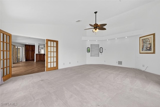 8060 Glenfinnan Cir, Fort Myers, FL 33912 - unfurnished living room with french doors, carpet floors, a ceiling fan, and high vaulted ceiling
