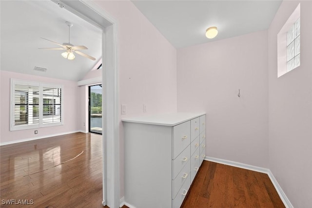8060 Glenfinnan Cir, Fort Myers, FL 33912 - corridor featuring dark wood-style flooring and vaulted ceiling