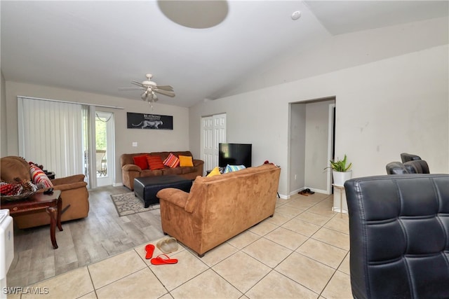 936-938 Eisenhower Blvd, Lehigh Acres, FL 33974 - living room featuring vaulted ceiling, ceiling fan, and light tile patterned flooring