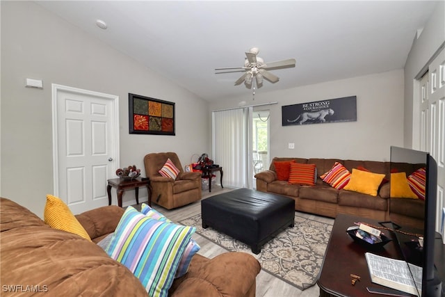 936-938 Eisenhower Blvd, Lehigh Acres, FL 33974 - living room with wood finished floors, a ceiling fan, and lofted ceiling