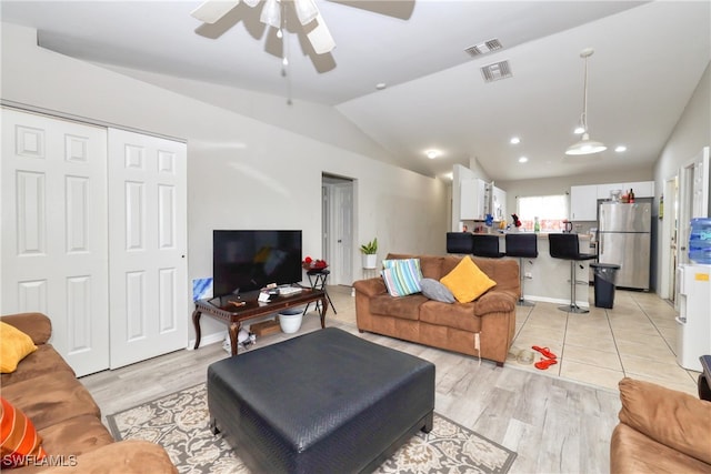 936-938 Eisenhower Blvd, Lehigh Acres, FL 33974 - living area with vaulted ceiling, ceiling fan, light wood-style floors, and recessed lighting