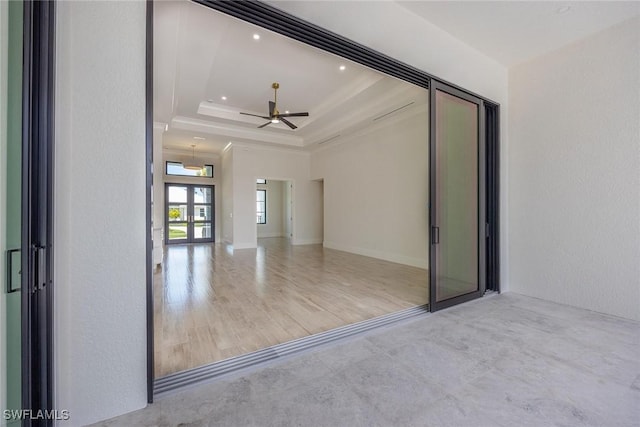 101 Beachcomber St, Marco Island, FL 34145 - spare room featuring a raised ceiling, crown molding, ceiling fan, and recessed lighting