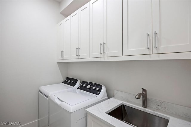 101 Beachcomber St, Marco Island, FL 34145 - laundry area with independent washer and dryer and cabinet space