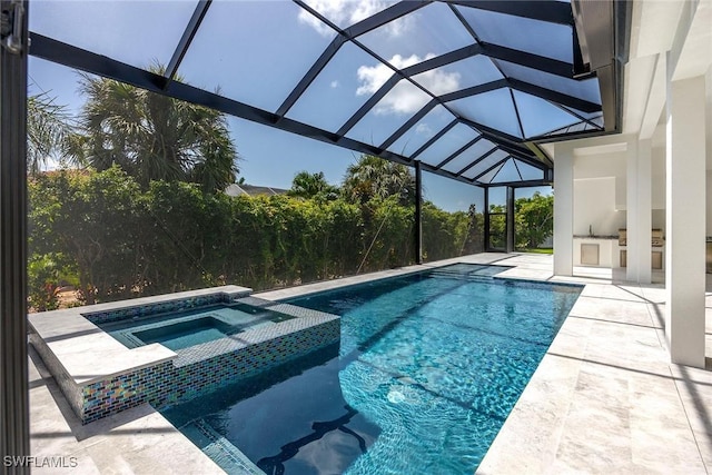 101 Beachcomber St, Marco Island, FL 34145 - view of pool with a patio area, glass enclosure, a bar, and a pool with connected hot tub