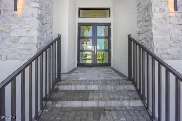 101 Beachcomber St, Marco Island, FL 34145 - entrance to property with french doors, stucco siding, and stone siding