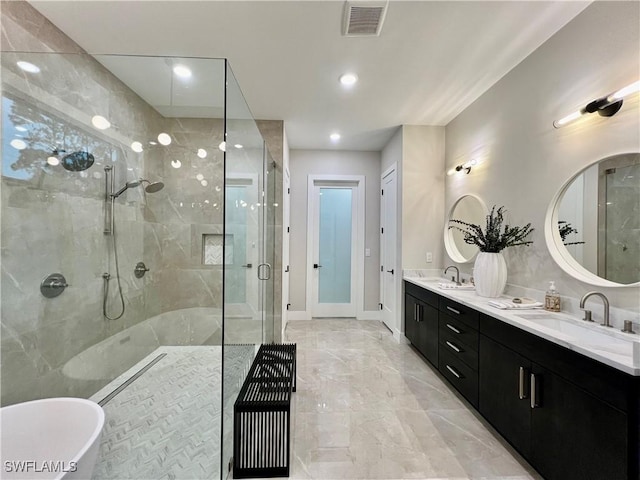 240 Allamanda Way, Naples, FL 34114 - full bath with a shower stall, a freestanding bath, double vanity, marble finish floors, and recessed lighting