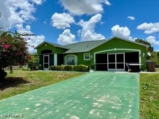 1122 Mckinley Ave, Lehigh Acres, FL 33972 - photo 1
