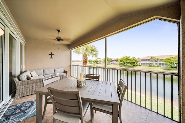 9636 Hemingway Ln Unit 4201, Fort Myers, FL 33913 - sunroom with a water view, ceiling fan, vaulted ceiling, an outdoor hangout area, and a residential view