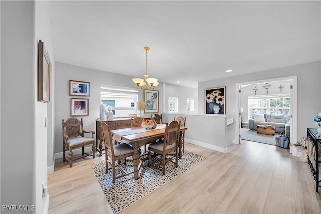 9636 Hemingway Ln Unit 4201, Fort Myers, FL 33913 - dining space featuring a chandelier, light wood-style floors, and recessed lighting