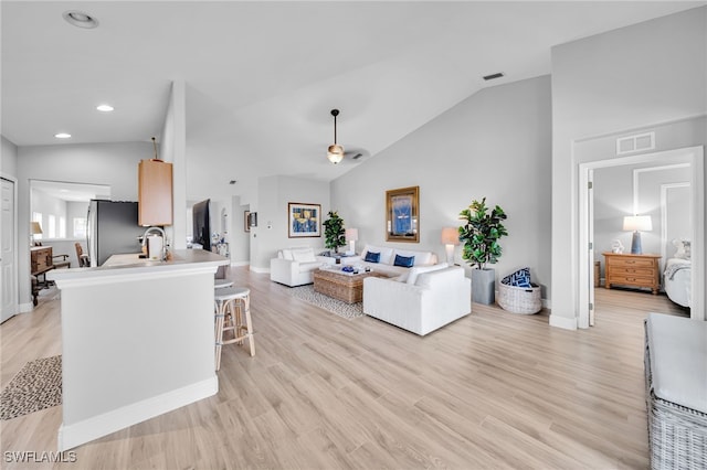 9636 Hemingway Ln Unit 4201, Fort Myers, FL 33913 - living area featuring vaulted ceiling, light wood-style floors, and recessed lighting